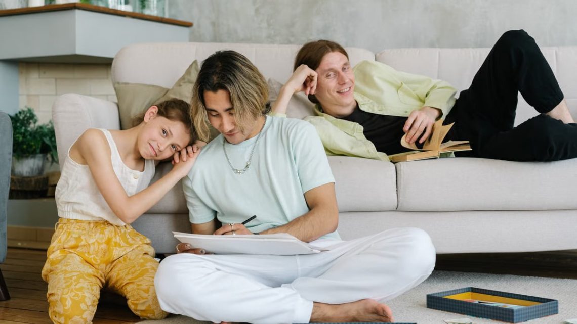 A family enjoying quality time in a comfortable living room setting.